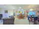 Spacious kitchen with an island, dining area, and ample cabinetry at 17096 Se 96Th Chapelwood Cir, The Villages, FL 32162