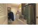Functional laundry room with a washer, dryer, and storage space at 17096 Se 96Th Chapelwood Cir, The Villages, FL 32162