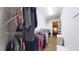 Spacious walk-in closet offers ample storage with shelving and hanging space at 17096 Se 96Th Chapelwood Cir, The Villages, FL 32162