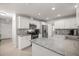 Modern kitchen with white cabinets and granite countertops at 19699 Sw 88Th Place Rd, Dunnellon, FL 34432