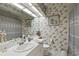 Clean bathroom with shower/tub combo and updated vanity at 22777 Sw Surf Blvd, Dunnellon, FL 34431