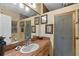 Elegant bathroom with granite vanity, large mirror, and shower at 22777 Sw Surf Blvd, Dunnellon, FL 34431