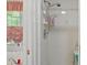 Bathroom with shower stall and updated fixtures at 22777 Sw Surf Blvd, Dunnellon, FL 34431
