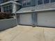 Spacious two-car garage, offering ample parking and additional storage space at 22777 Sw Surf Blvd, Dunnellon, FL 34431