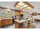 Bright kitchen features an island, wood cabinets, and a breakfast nook at 22777 Sw Surf Blvd, Dunnellon, FL 34431