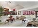 Spacious living area features a high ceiling and comfy seating at 22777 Sw Surf Blvd, Dunnellon, FL 34431