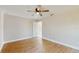 Bright bedroom with wood-look floors and ceiling fan at 2308 Sw 168Th Loop, Ocala, FL 34473