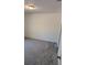 Spacious bedroom with neutral carpeting at 24162 Nw Hemlock Ave, Dunnellon, FL 34431