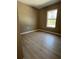 Bedroom with durable flooring, a neutral color palette, and lots of natural light at 24259 Nw Mallard Ave, Dunnellon, FL 34431