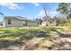 Spacious backyard with a view of neighboring homes at 281 Marion Oaks Crse, Ocala, FL 34473