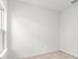 Simple bedroom with white walls and tile floors at 281 Marion Oaks Crse, Ocala, FL 34473