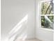 Bright bedroom with window and hardwood floors at 281 Marion Oaks Crse, Ocala, FL 34473