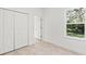 Bright bedroom with window, closet and tile floors at 281 Marion Oaks Crse, Ocala, FL 34473