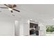 Open kitchen with dark cabinets, granite counters, and island at 281 Marion Oaks Crse, Ocala, FL 34473