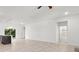 Open living area with tile floors and access to kitchen and bath at 281 Marion Oaks Crse, Ocala, FL 34473