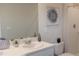 Modern bathroom with shower and updated vanity at 3288 Bertram Rd, Wildwood, FL 34785