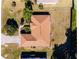 Aerial view of single-story house with driveway and yard at 3333 Nw 47Th Ct, Ocala, FL 34482