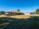 Home exterior showcasing a large backyard at 3333 Nw 47Th Ct, Ocala, FL 34482