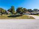 Single-Gathering home with large tree in front yard at 3333 Nw 47Th Ct, Ocala, FL 34482