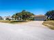 Single-Gathering home with large tree in front yard at 3333 Nw 47Th Ct, Ocala, FL 34482