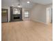 Spacious living room with a charming fireplace and neutral-toned flooring at 3856 Ne 19Th Street Cir, Ocala, FL 34470