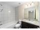 Bathroom boasts granite countertops and a shower/tub combo at 4069 Sw 130Th Pl, Ocala, FL 34473