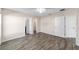 Bright bedroom with wood-look floors and ample closet space at 4069 Sw 130Th Pl, Ocala, FL 34473
