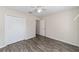 Spacious bedroom with double door closet and wood-look floors at 4069 Sw 130Th Pl, Ocala, FL 34473