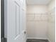Large walk-in closet with wire shelving for convenient storage at 4069 Sw 130Th Pl, Ocala, FL 34473