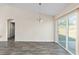 Bright dining area with hardwood floors and backyard access at 4069 Sw 130Th Pl, Ocala, FL 34473