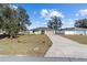 A charming single-Gathering home with an attached two-car garage and a well-manicured lawn at 4069 Sw 130Th Pl, Ocala, FL 34473