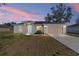 Charming single-story home featuring an attached two-car garage and well-maintained lawn at 4069 Sw 130Th Pl, Ocala, FL 34473