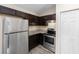 Well-equipped kitchen with stainless steel appliances and ample counter space at 4069 Sw 130Th Pl, Ocala, FL 34473