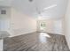 Sunlit living room with hardwood floors and neutral walls at 4069 Sw 130Th Pl, Ocala, FL 34473