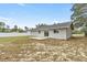 Home features a large backyard with a patio and fenced-in area at 4677 Sw 166Th Loop, Ocala, FL 34473