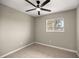 Bright bedroom with ceiling fan and tile floors at 4677 Sw 166Th Loop, Ocala, FL 34473