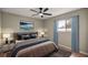 Spacious bedroom with large bed, nightstands, and artwork at 4677 Sw 166Th Loop, Ocala, FL 34473