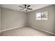 Bright bedroom with ceiling fan and tile floors at 4677 Sw 166Th Loop, Ocala, FL 34473
