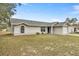 Newly built home with gray roof, light-colored siding, and a spacious yard at 4677 Sw 166Th Loop, Ocala, FL 34473