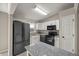 Modern kitchen with granite countertops and black appliances at 4677 Sw 166Th Loop, Ocala, FL 34473