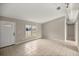 Living room with tile floors and large window for natural light at 4677 Sw 166Th Loop, Ocala, FL 34473