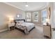 Cozy bedroom with bay window and ceiling fan at 5695 Sw 94Th Ave, Ocala, FL 34481