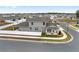 Aerial view of two story house with backyard and community at 6115 Sw 74Th Ct, Ocala, FL 34474
