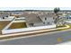 Aerial view of house, backyard, and surrounding community at 6115 Sw 74Th Ct, Ocala, FL 34474