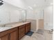 Double vanity bathroom with a large shower and a separate tub at 6115 Sw 74Th Ct, Ocala, FL 34474