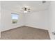 Simple bedroom with carpeted floor and ceiling fan at 6115 Sw 74Th Ct, Ocala, FL 34474