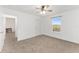 Bright bedroom with carpeted floor and window at 6115 Sw 74Th Ct, Ocala, FL 34474