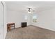 Spacious bedroom featuring a ceiling fan and window at 6115 Sw 74Th Ct, Ocala, FL 34474