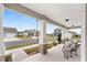 Front porch with rocking chairs and view of the neighborhood at 6115 Sw 74Th Ct, Ocala, FL 34474