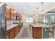 Spacious kitchen with granite countertops and wood cabinets at 6115 Sw 74Th Ct, Ocala, FL 34474